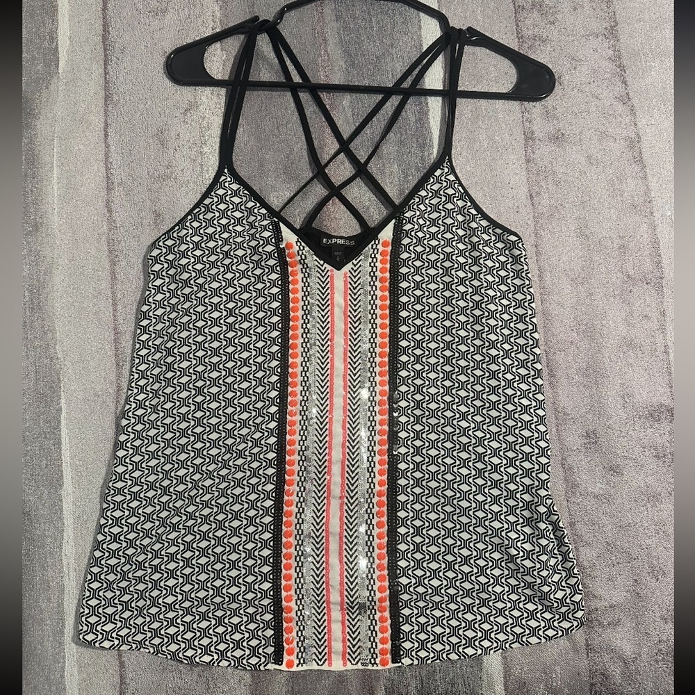 Black and White Patterned Top with Orange Accents